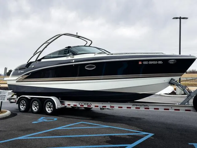 Slide: The Image of 2016 Formula Boats 290 Bowrider on trailer in parking lot. - 3