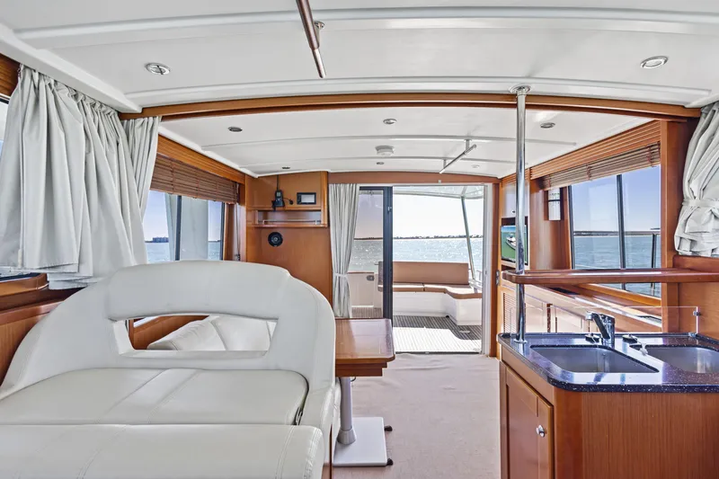 Slide: The Image of Interior of 2012 Beneteau Swift Trawler 44, featuring modern design and ocean view. - 23