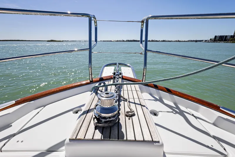 Slide: The Image of Bow view of 2012 Beneteau Swift Trawler 44 on calm waters. - 6