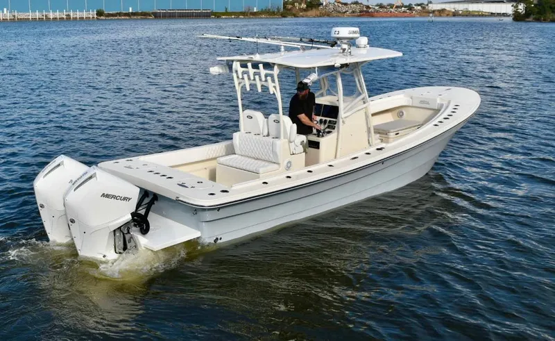 Slide: The Image of 2021 Panga Marine boat on water with Mercury outboard engine. - 3