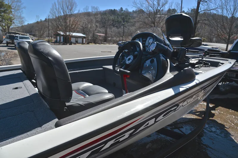 Slide: The Image of 2023 Bass Tracker PRO TEAM 175 TF boat interior with steering console and seats. - 19