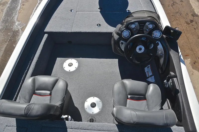 Slide: The Image of 2023 Bass Tracker PRO TEAM 175 TF boat interior with steering console and seating. - 20