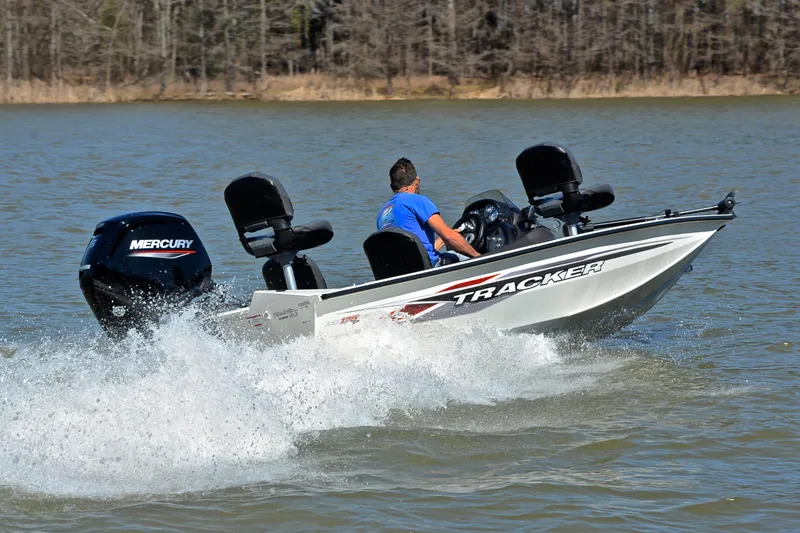 Slide: The Image of 2023 Bass Tracker PRO TEAM 175 TF boat speeding on a lake with Mercury engine. - 5