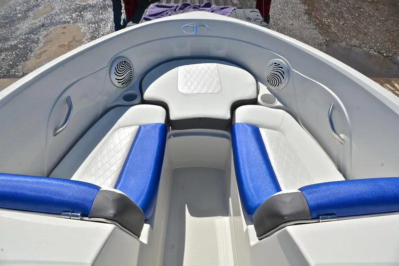 Slide: The Image of 2015 Tahoe 500 TS boat interior with blue and white seating. - 19