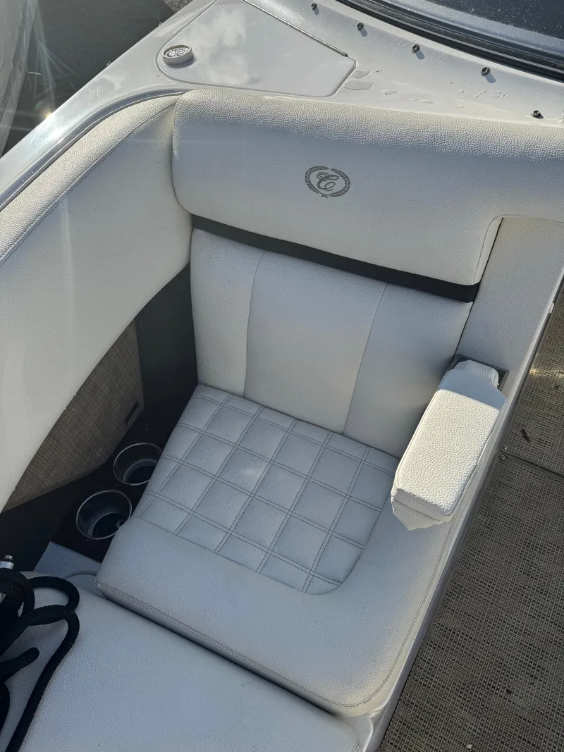 Slide: The Image of 2018 Cobalt R7 boat with white cushioned seating and cup holders. - 14