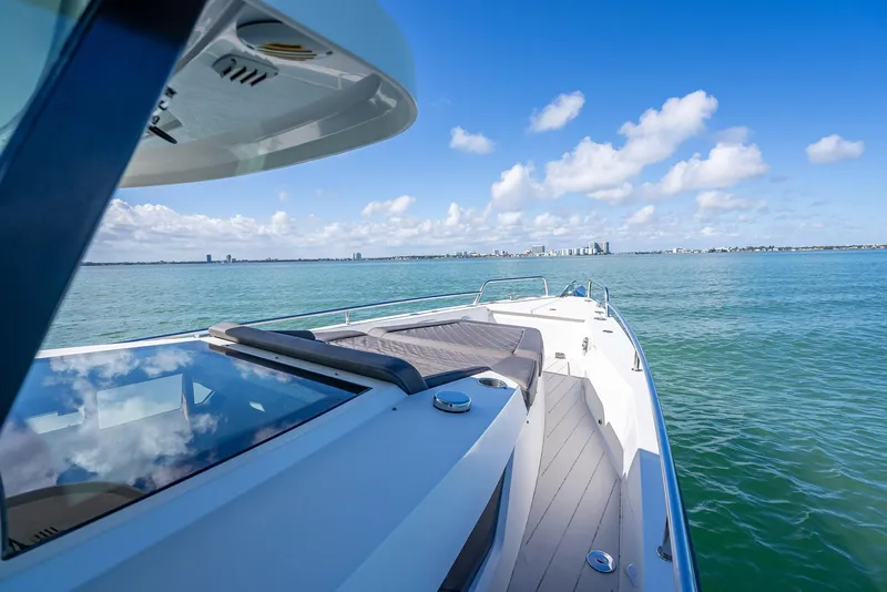 Slide: The Image of Axopar 37 XC Cross Cabin 2017 cruising on a sunny day with clear blue skies. - 20