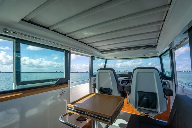 Slide: The Image of Interior of 2017 Axopar 37 XC Cross Cabin with ocean view. - 7