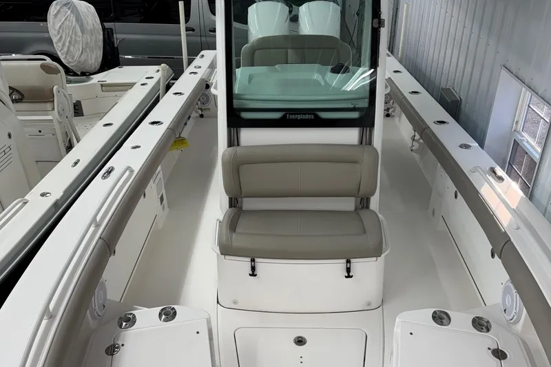 Slide: The Image of 2019 Everglades 273 Center Console boat interior with seating and console view. - 5