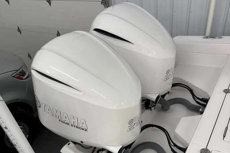 Slide: The Image of Twin Yamaha four-stroke engines on a 2019 Everglades 273 Center Console boat. - 9
