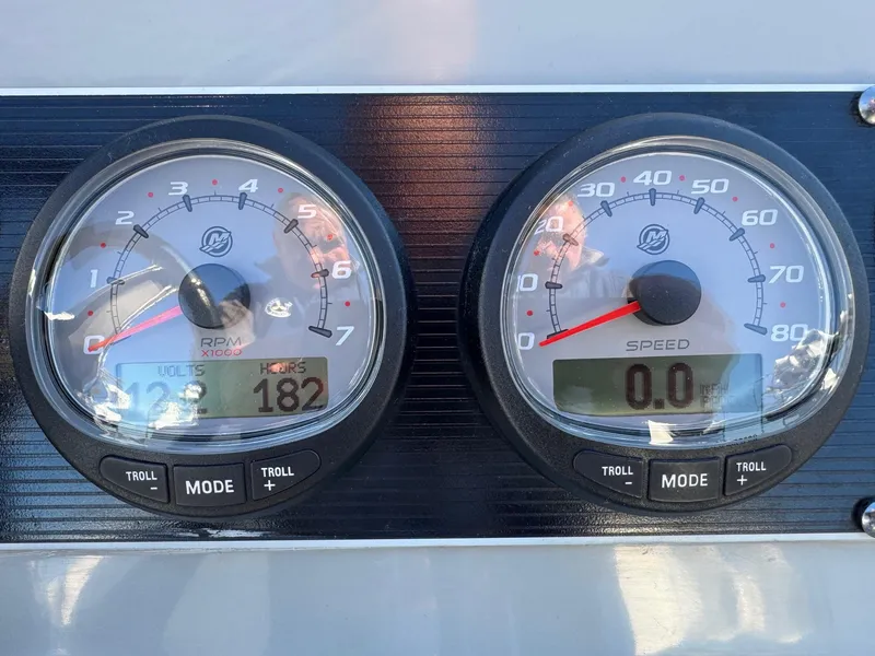 Slide: The Image of Close-up of 2014 Boston Whaler 210 Dauntless boat gauges showing RPM and speed. - 19