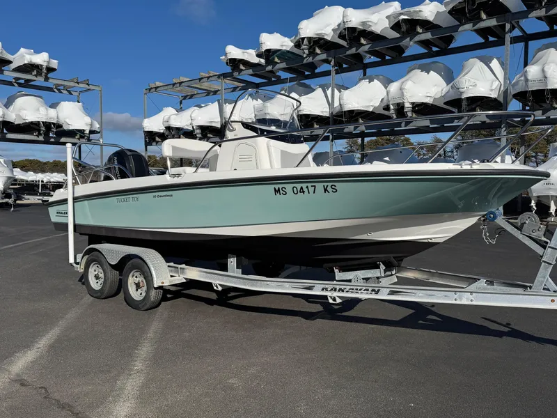 Slide: The Image of 2014 Boston Whaler 210 Dauntless boat on trailer in storage facility. - 3