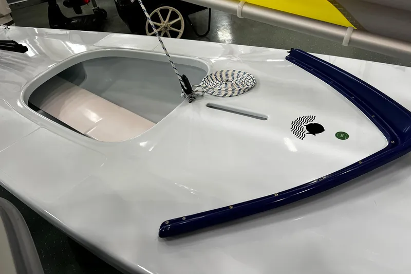 Slide: The Image of 2024 Sunfish Laser sailboat deck with sleek design and modern features. - 6