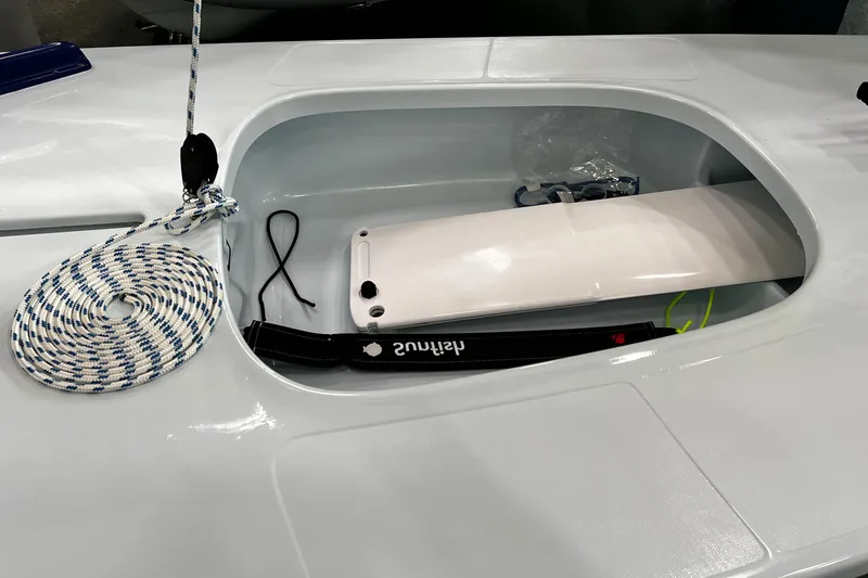 Slide: The Image of 2024 Sunfish/Laser sailboat cockpit with rope and equipment storage. - 7