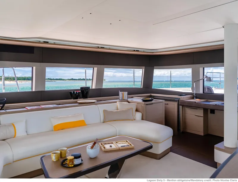 Slide: The Image of Luxurious interior of 2025 Lagoon SIXTY 5 yacht with ocean view and modern furnishings. - 20