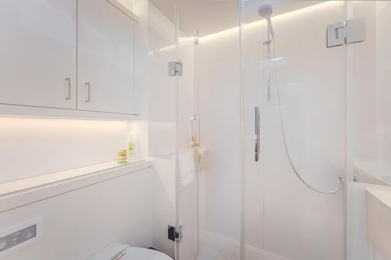 Slide: The Image of Modern bathroom in 2025 Lagoon SIXTY 5 yacht with sleek shower and cabinetry. - 36
