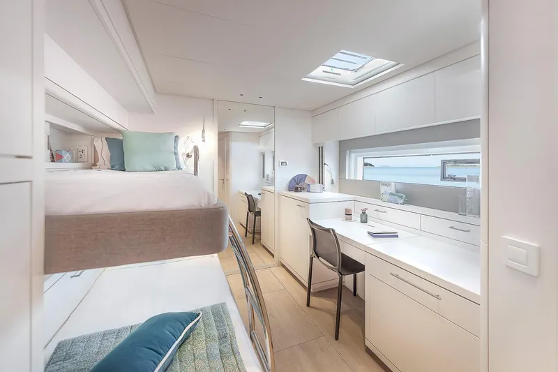 Slide: The Image of Luxurious interior of 2025 Lagoon SIXTY 5 yacht with modern design and natural light. - 45