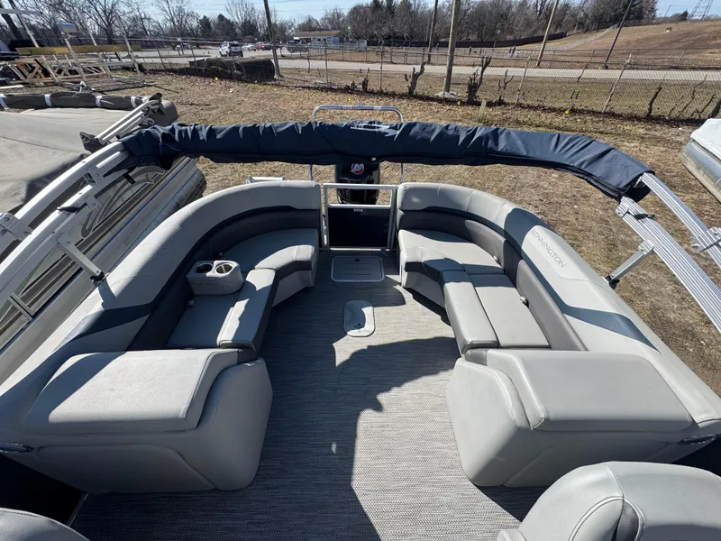 Slide: The Image of 2022 Bennington 23 SXSR pontoon boat with spacious seating and modern design. - 12