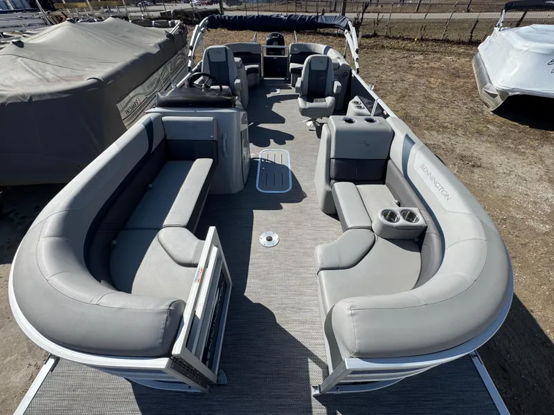 Slide: The Image of 2022 Bennington 23 SXSR pontoon boat with spacious seating and modern design. - 4
