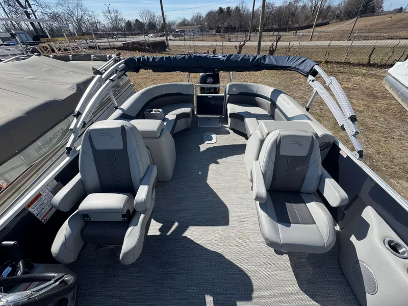 Slide: The Image of 2022 Bennington 23 SXSR pontoon boat interior with plush seating and modern design. - 7