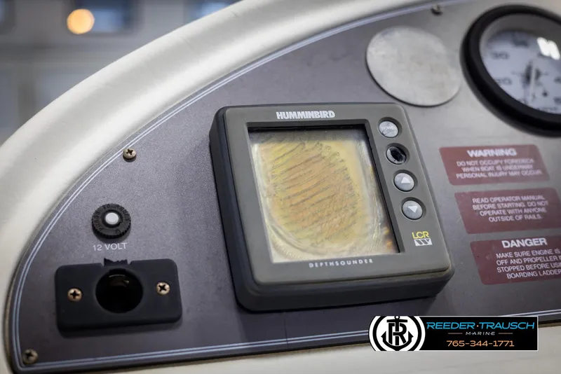 Slide: The Image of Control panel of a 1998 Crest 22 DLX boat with Humminbird depth sounder. - 27
