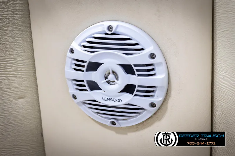 Slide: The Image of Kenwood speaker installed on a 1998 Crest 22 DLX boat interior panel. - 33