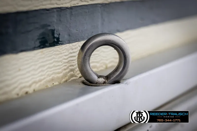 Slide: The Image of Close-up of a metal loop on a 1998 Crest 22 DLX boat. - 43