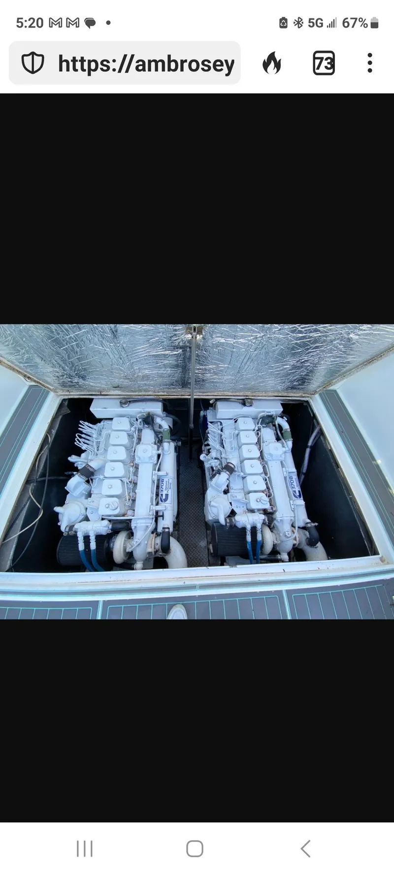 Slide: The Image of Engine compartment of 2000 Dawson Yachts 33 EXPRESS, showcasing dual engines. - 12