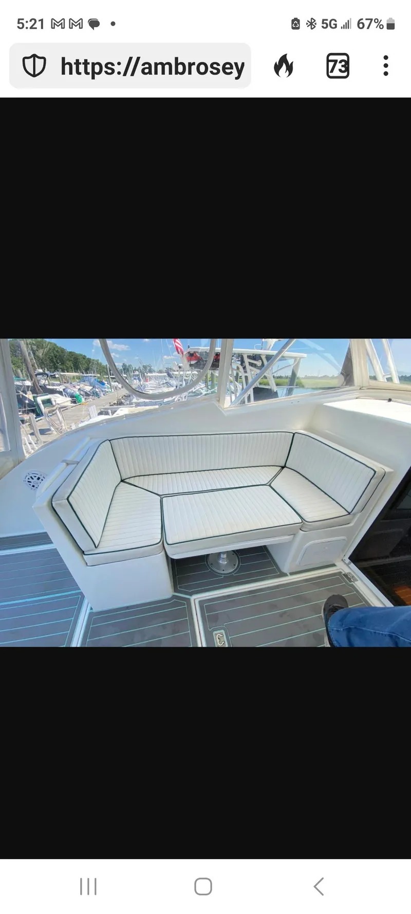 Slide: The Image of Dawson Yachts 33 EXPRESS 2000 model with white cushioned seating area. - 22