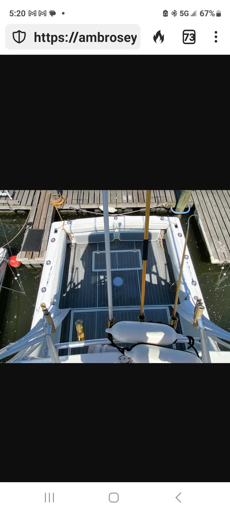 Slide: The Image of Dawson Yachts 33 EXPRESS 2000 model docked at a marina, viewed from above. - 6