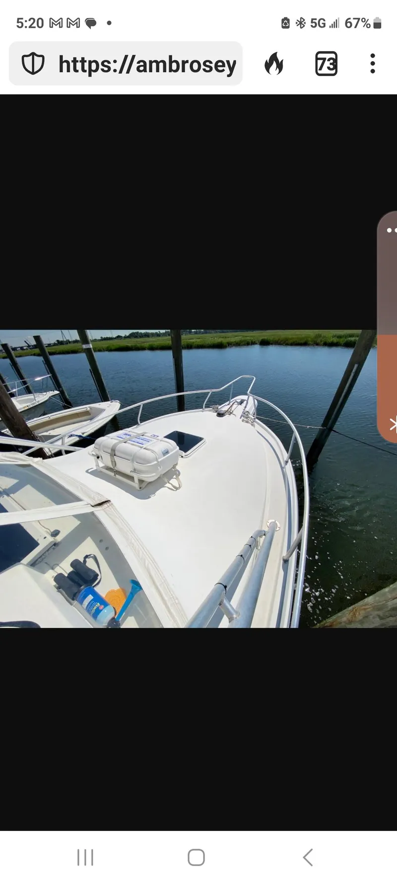 Slide: The Image of 2000 Dawson Yachts 33 EXPRESS docked, showcasing sleek design and spacious deck. - 7