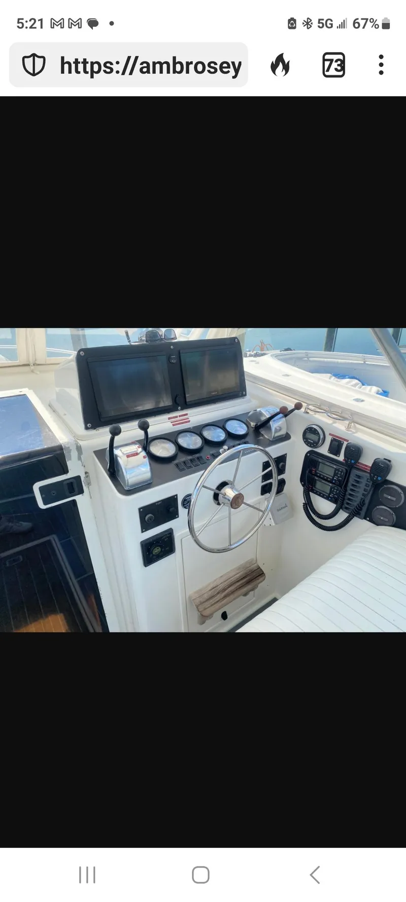 Slide: The Image of Control panel of 2000 Dawson Yachts 33 EXPRESS with navigation screens and gauges. - 24