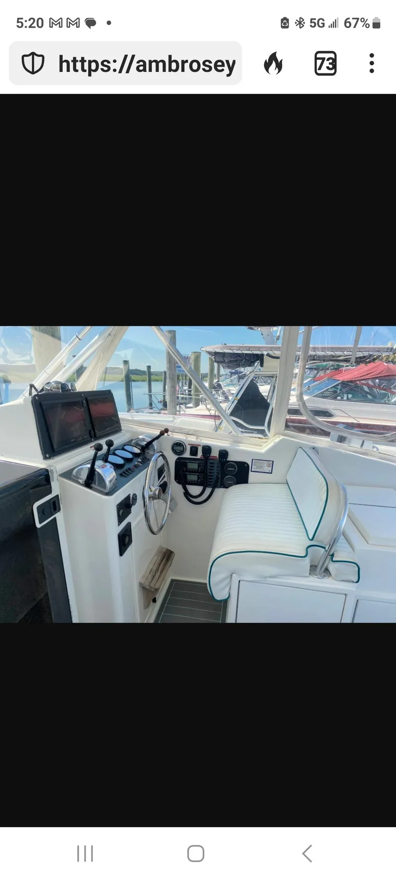 Slide: The Image of Dawson Yachts 33 EXPRESS 2000 helm with modern controls and seating, dockside view. - 5