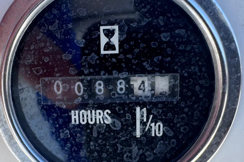 Slide: The Image of 2021 Clearwater 2000 C/C boat at dealership, surrounded by other boats under cloudy sky. - 14