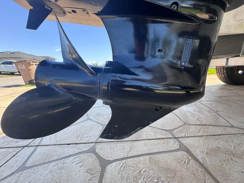 Slide: The Image of 2021 Clearwater 2000 C/C boat at a sales lot under a cloudy sky. - 16