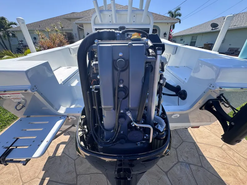 Slide: The Image of Clearwater 2000 C/C 2021 boat dashboard with steering wheel and control panel. - 20