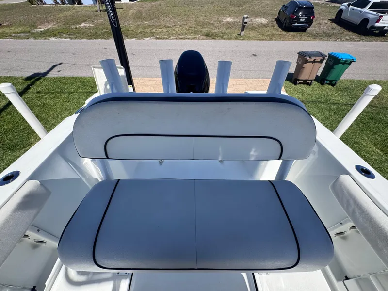 Slide: The Image of Bow seating area of 2021 Clearwater 2000 C/C boat with white cushions. - 27