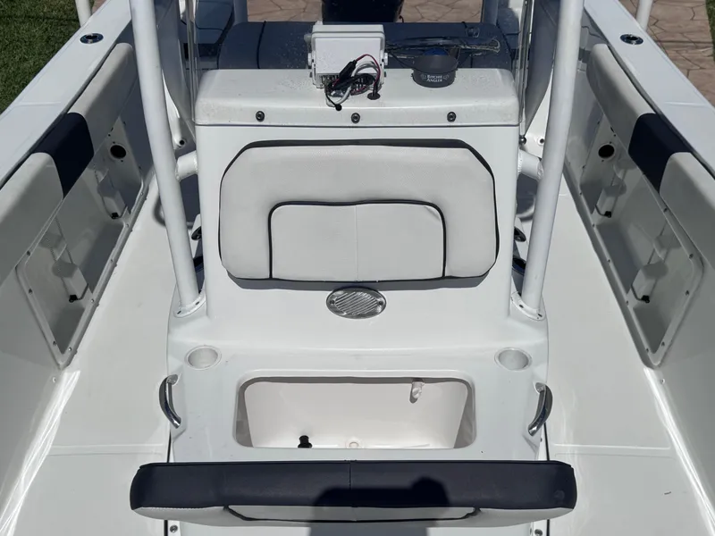Slide: The Image of 2021 Clearwater 2000 C/C boat interior with cushioned seating and trolling motor. - 30
