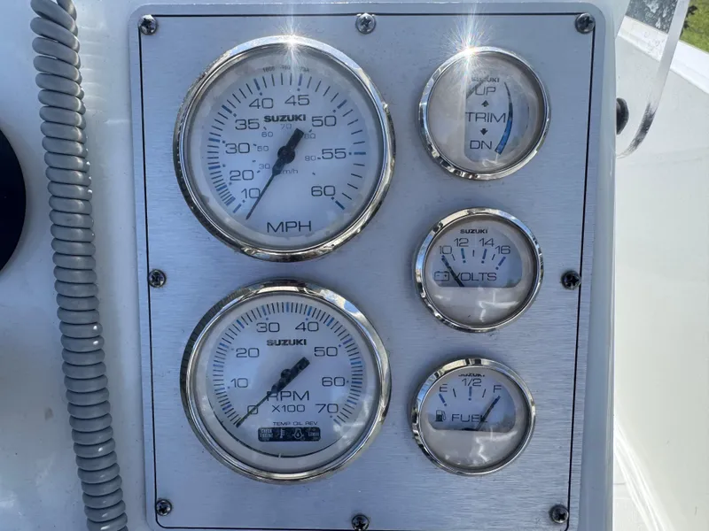 Slide: The Image of 2021 Clearwater 2000 C/C boat interior with steering wheel and seating. - 33