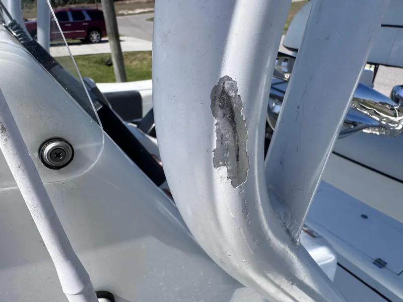 Slide: The Image of 2021 Clearwater 2000 C/C boat interior with seating and Suzuki outboard motor. - 34