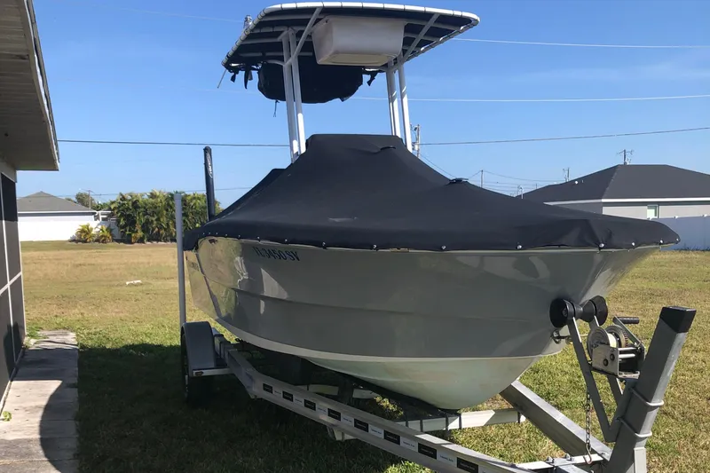 Slide: The Image of Open storage compartment on a 2021 Clearwater 2000 C/C boat, showing interior details. - 40