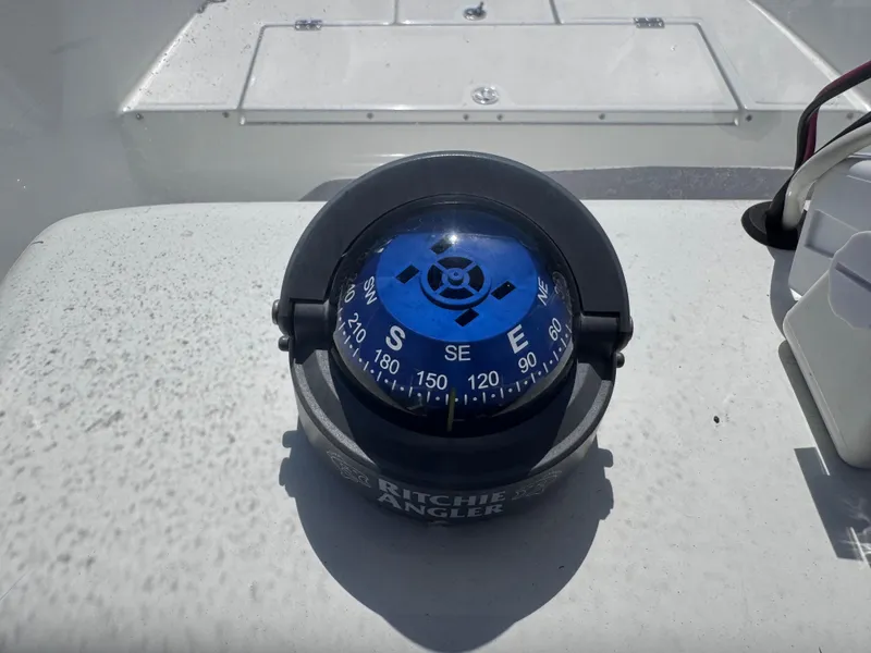 Slide: The Image of Battery compartment of 2021 Clearwater 2000 C/C boat with wiring and secure straps. - 51