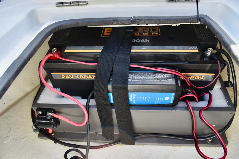 Slide: The Image of Deck of 2021 Clearwater 2000 C/C boat with storage compartments and railing. - 55