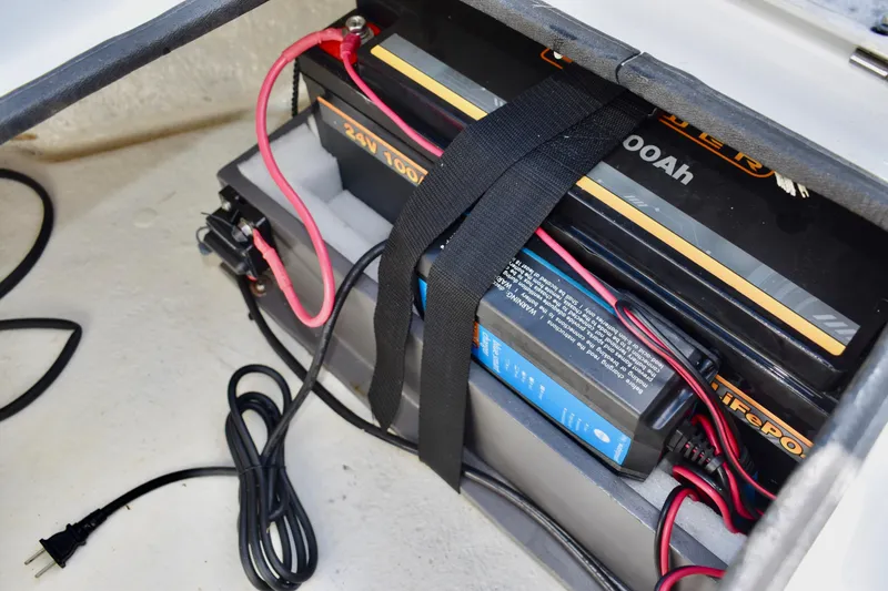 Slide: The Image of Hinged compartment on 2021 Clearwater 2000 C/C boat deck. - 58