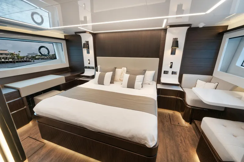 Slide: The Image of Luxurious bedroom interior of 2022 Pearl 62 yacht with modern design and elegant furnishings. - 14