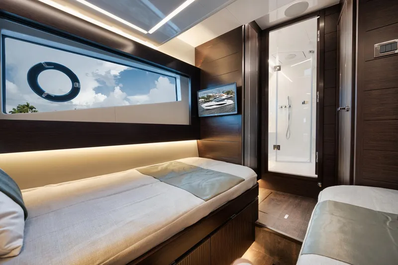 Slide: The Image of Luxurious interior of 2022 Pearl 62 yacht with modern design and comfortable bedding. - 16