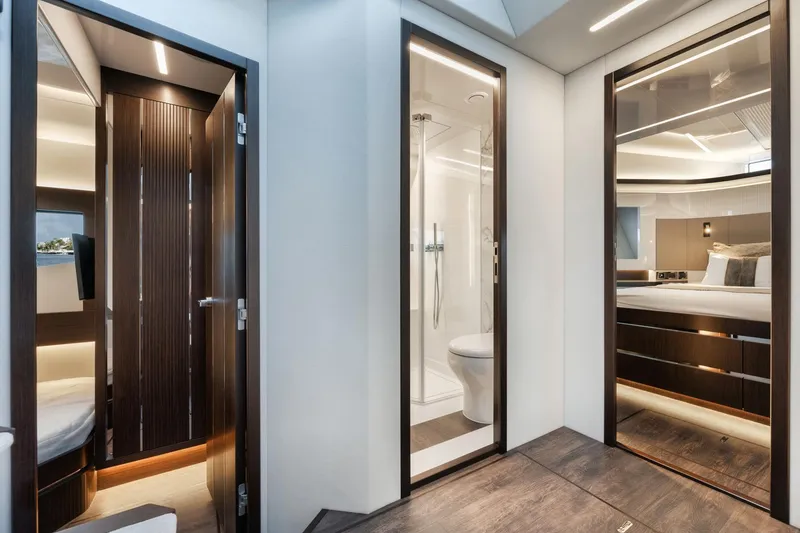 Slide: The Image of Luxurious interior of 2022 Pearl 62 yacht featuring modern bathroom and bedroom design. - 17