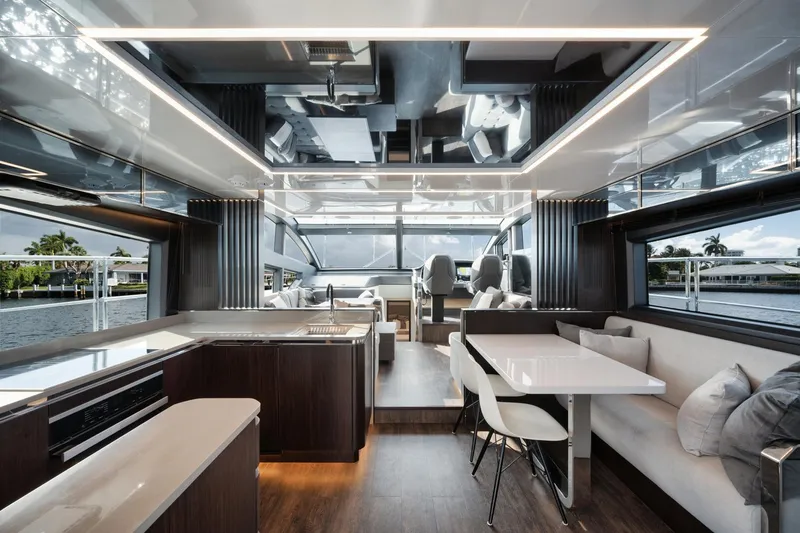 Slide: The Image of Luxurious interior of 2022 Pearl 62 yacht with modern kitchen and dining area. - 3