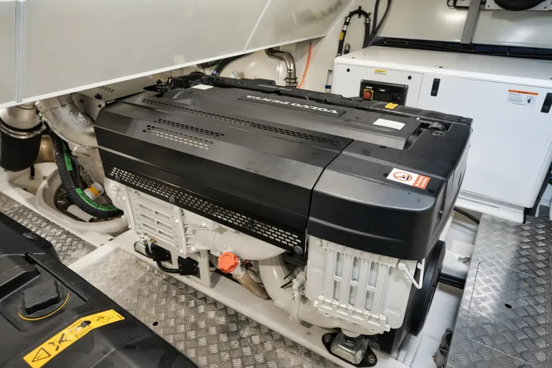 Slide: The Image of 2022 Pearl 62 engine room showcasing modern marine engine design. - 33