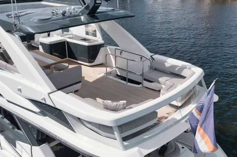 Slide: The Image of Luxurious 2022 Pearl 62 yacht with spacious deck and modern design on water. - 47