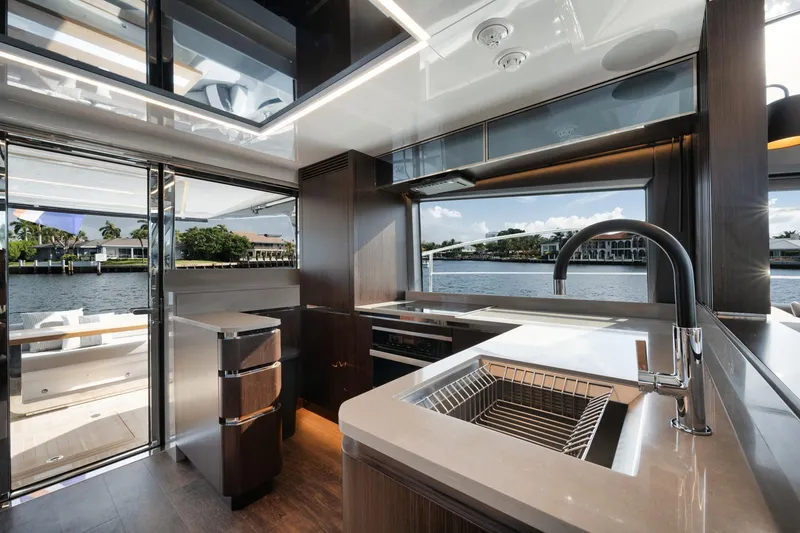 Slide: The Image of Luxurious kitchen interior of 2022 Pearl 62 yacht with modern appliances and waterfront view. - 5
